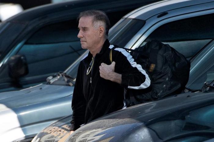 Brazilian businessman Eike Batista arrives at the Federal Police headquarters after being arrested on corruption charges related to the "Car Wash" operation in Rio de Janeiro