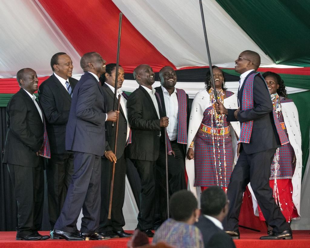 President Uhuru Kenyatta and DP William Ruto dancing during the 17th National Prayer Breakfast. DP Ruto proposed donating Raila to UK