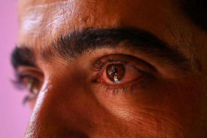 Abid Khan says he was dragged out and blindfolded along with his brother before he was beaten