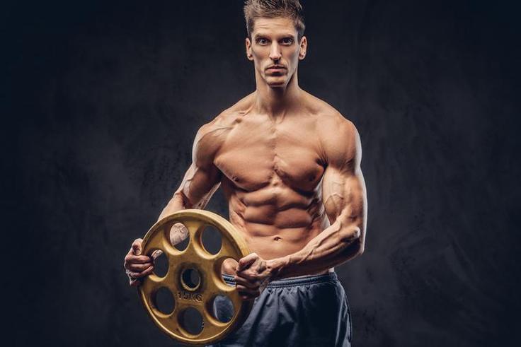 This Weight Plate Workout Builds Strong Abs
