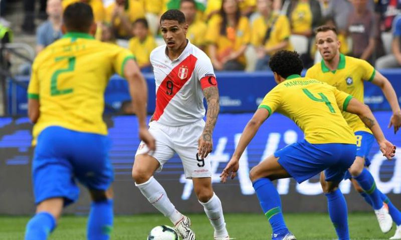 Peru striker Paolo Guerrero (second from left) was well shackled by Brazil's defense when the two sides met in the Copa America group stage