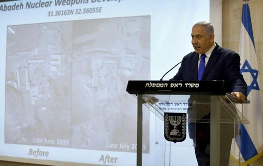Israeli Prime Minister Benjamin Netanyahu shows to media what he says is evidence of a secret Iranian nuclear site