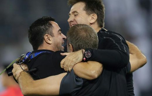 Sadd SC's Spanish coach Xavi Hernandez celebrates with his staff after his team's 3-1 AFC Champions League quarter-final football match victory against Saudi's Al-Nassr at the Jassim bin Hamad Stadium in Doha on September 16, 2019.