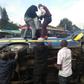 Members of the public assist passengers on 14-seater matatu that overturned at Ngara along Murang'a Road