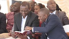 File image of Deputy President William Ruto (left) and Kikuyu MP Kimani Ichungwa during a past church service at PCEA Church in Mwiki