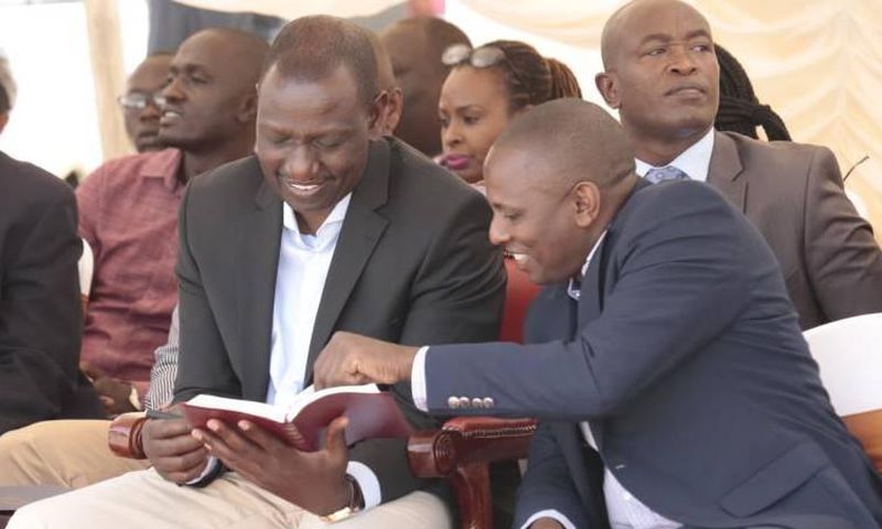 File image of Deputy President William Ruto (left) and Kikuyu MP Kimani Ichungwa during a past church service at PCEA Church in Mwiki
