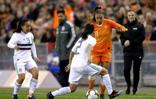 Lieke Martens (R) in action against Mexico. The Barcelona player starred in the Dutch team that won Euro 2017 as hosts