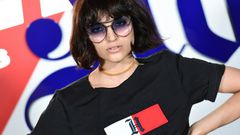 As the fashion world looks to go green, Italian influencer Federica Messaggeri poses during the presentation of the 'Tommy X Lewis' collection, a collaboration between US designer Tommy Hilfiger and British Formula One driver Lewis Hamilton
