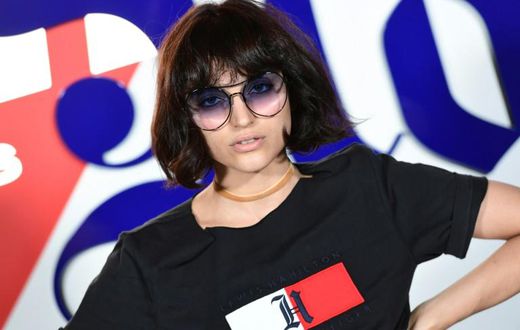 As the fashion world looks to go green, Italian influencer Federica Messaggeri poses during the presentation of the 'Tommy X Lewis' collection, a collaboration between US designer Tommy Hilfiger and British Formula One driver Lewis Hamilton