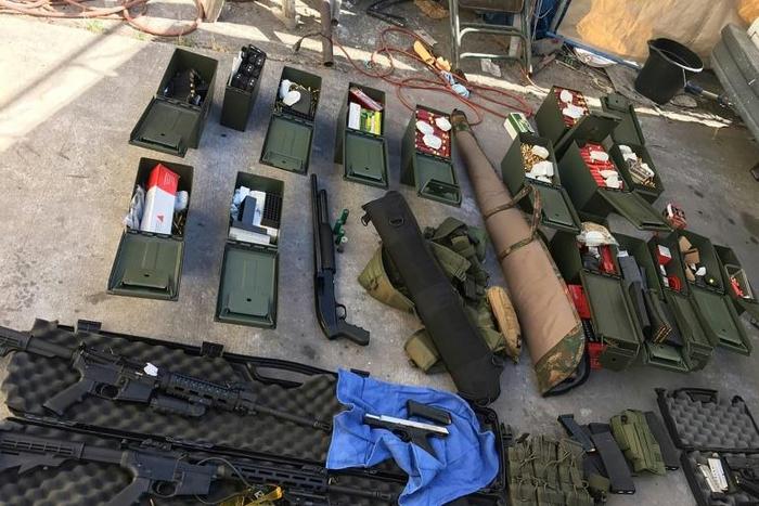 Guns, ammunition and tactical gear seized by police near Los Angeles after arresting a man who threatened a mass shooting
