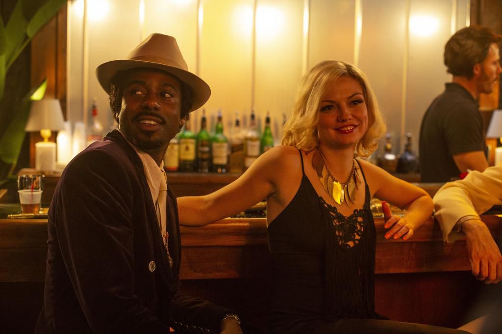 Lori Madison (Emily Meade) alongside her pimp C.C. (Gary Carr)