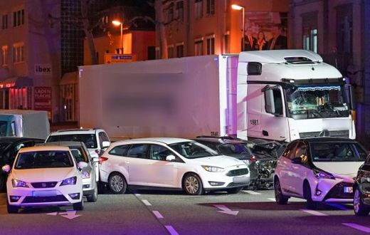 A stolen truck crashed into cars stopped at a red light in Limburg, western Germany, leaving several people injured