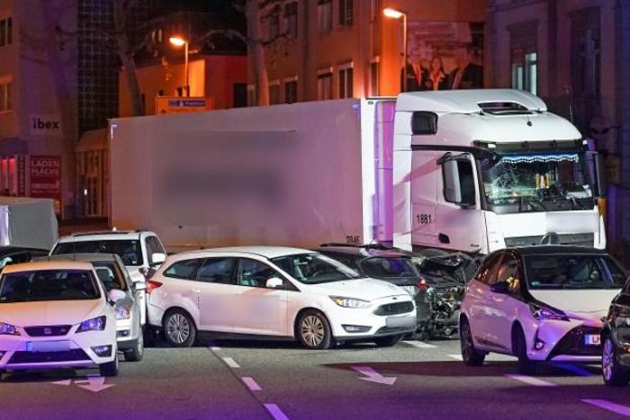 A stolen truck crashed into cars stopped at a red light in Limburg, western Germany, leaving several people injured