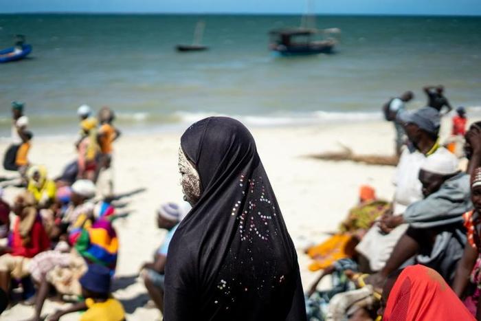 Man Yam, 19, endures the wait for aid on Ibo where the majority of the population is Muslim