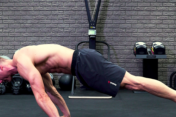 The Planche Rock to Pushup Carves Superhuman Abs