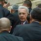 Former Colombian president Alvaro Uribe (C) arrives at the Palace of Justice for a hearing before the Supreme Court in a case over witness tampering