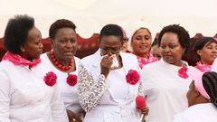 Sabina Chege is comforted by other women leaders after breaking into tears