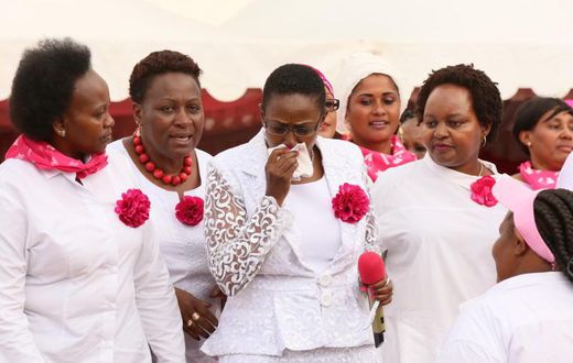 Sabina Chege is comforted by other women leaders after breaking into tears