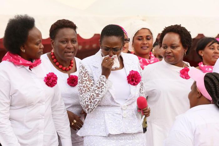 Sabina Chege is comforted by other women leaders after breaking into tears