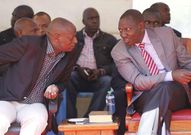 File image of CS Charles Keter with DP Ruto