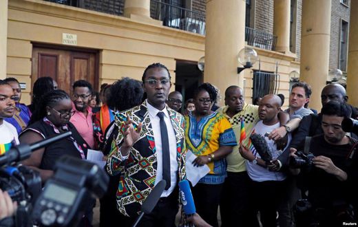 LGBTI activists during a press briefing shortly after the high court upheld a law banning gay sex on  May 24, 2019