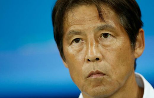 Japan's coach Akira Nishino looks on before the Russia 2018 World Cup round of 16 football match between Belgium and Japan at the Rostov Arena in Rostov-On-Don on July 2, 2018.