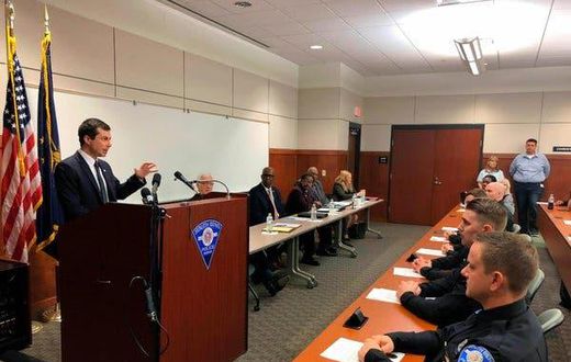 Buttigieg tells police recruits of the burden of racial injustice