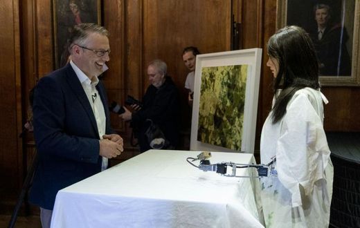 Gallery owner Aidan Meller (L) is selling works by robot artist Ai-Da
