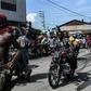 (FILES) In this file photo taken on September 23, 2019 demonstrators march on the street near parliament as they protest against ruling government in Port-au-Prince. The UN has called for calm in crisis-wracked Haiti, eight days before the end of its p...