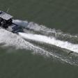 A US Border Patrol boat moves along the Rio Grande river that separates the United States and Mexico