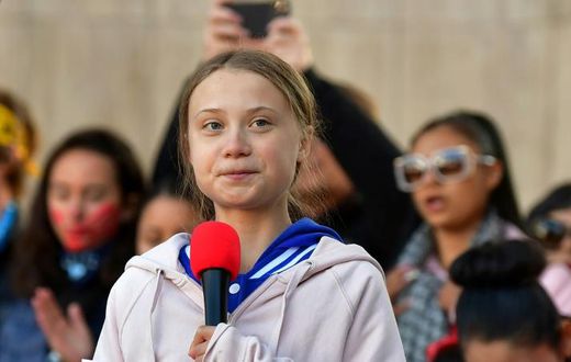 Swedish environment activist Greta Thunberg speaks during a "FridaysForFuture" climate protest at Civic Center Park in Denver, Colorado, on October 11, 2019