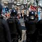 Riot police face off against demonstrators in Buenos Aires, during a protest against the economic policies Argentine President Mauricio Macri. Argentina will hold presidential elections next October 27.