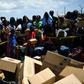 Bahamians waiting to be evacuated from the dock at Marsh Harbour, on the island of Abaco, which was devatsted by hurricane Dorian
