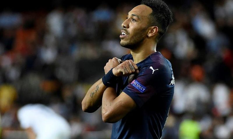 Triple top: Arsenal's Pierre-Emerick Aubameyang celebrates his hat-trick
