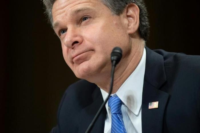 FBI Director Christopher Wray says the FBI has nearly 1,000 open investigations into intellectual property theft, nearly all of them involving Chinese