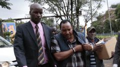 File image of Ferdinand Waititu with detectves  during his recent arrest over corruption