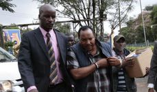 File image of Ferdinand Waititu with detectives during a past arrest. DPP asks court to half Kiambu Governor Ferdinand Waititu's salary