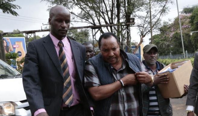 File image of Ferdinand Waititu with detectives during a past arrest. DPP asks court to half Kiambu Governor Ferdinand Waititu's salary