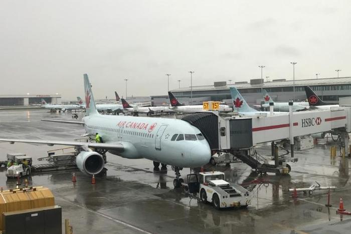 Tiffani Adams was left onboard an Air Canada plane after landing, and woke up alone in the darkened aircraft