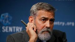 US actor George Clooney takes part in a press conference in central London to present a report on corruption in South Sudan
