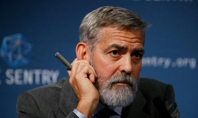 US actor George Clooney takes part in a press conference in central London to present a report on corruption in South Sudan