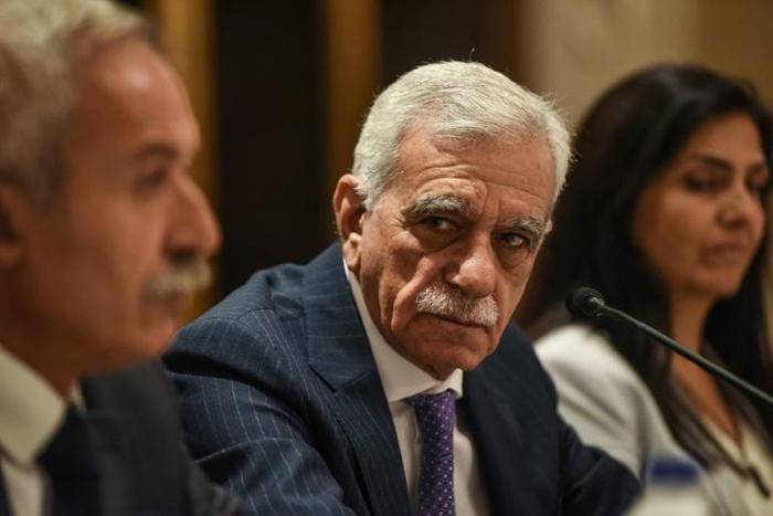 The removed mayor of Mardin, Ahmet Turk (C), called the move a "political decision"