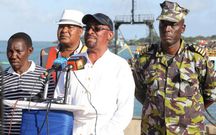 Kenya Ferry Services Chairman Dan Mwazo (in white) and KFS Managing Director Bakari Gowa (left)