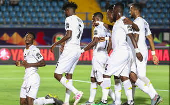 Black Stars celebrate their second goal.