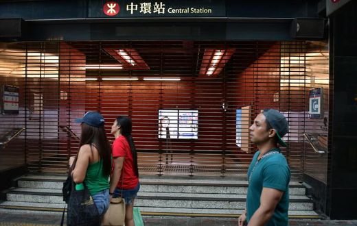 Hong Kong ground to a halt on Saturday after another night of violence