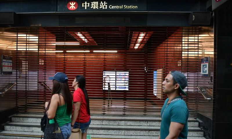 Hong Kong ground to a halt on Saturday after another night of violence