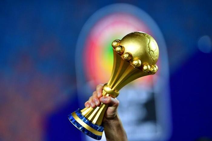 Algerian players celebrate with the trophy after winning the 2019 Africa Cup of Nations (CAN) final against Senegal