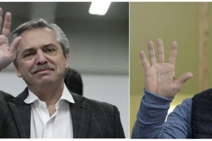 Alberto Fernandez, candidate of the Frente de Todos (Front for All) party, (L) was the top vote-getter in Argentina's presidential primaries, dealing a major blow to President Mauricio Macri, who is running for re-election