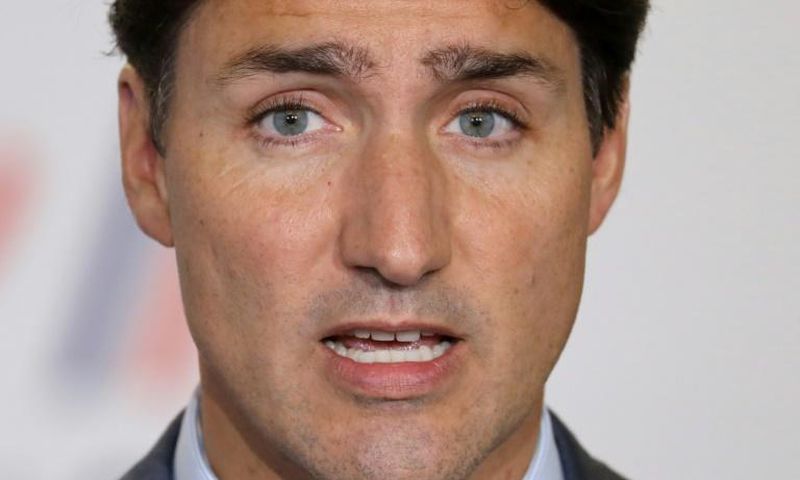 Canada's Prime Minister Justin Trudeau announced two measures aimed at wooing middle-class voters but once again had to defend himself after images showing him in blackface emerged
