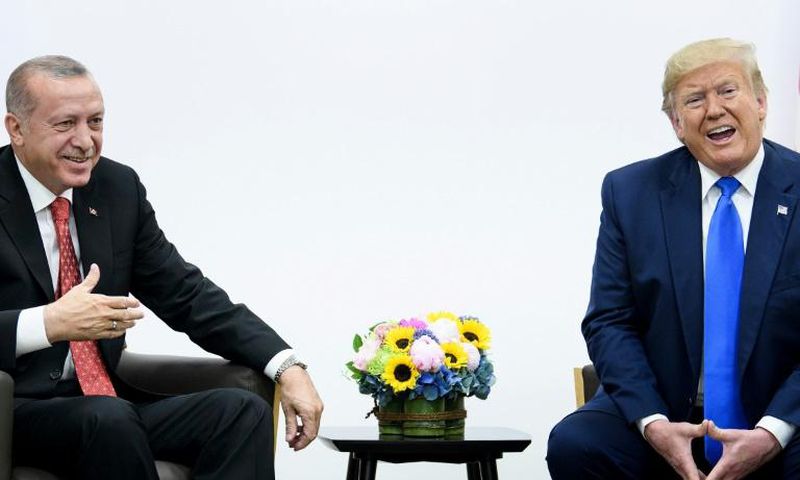 Turkey's President Recep Tayyip Erdogan (L) and US President Donald Trump attend a bilateral meeting during the G20 Summit in Osaka on June 29, 2019